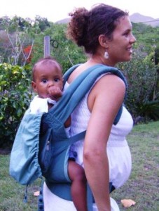 Ergo carrier with baby on back and pregnant belly at the front!