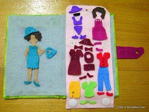 tan doll with wardrobe